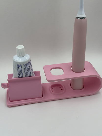 Suport pentru doua periute Philips Sonicare Roz cu dispozitiv de stoarcere a pastei de dinti