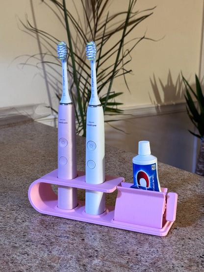 Suport pentru doua periute Philips Sonicare Roz cu dispozitiv de stoarcere a pastei de dinti